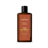 Cremo rich-lather body wash with golden amber bottle for a refreshed cleanse.