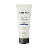 Cremo Cooling Shave Cream bottle demonstrates slick glide for a close shave.
