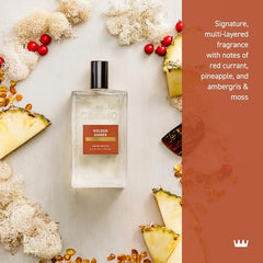 Cremo Golden Amber spray-shot highlights bright, layered notes.