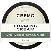 Cremo Hair Styling Cream bottle shows mid-length control and natural texture.