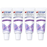 Crest 3D White Brilliance travel-size toothpaste tube for whitening on the go and cavity protection.