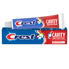 Crest Cavity Protection toothpaste tube close-up highlighting enamel protection and minty freshness.