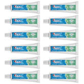 Crest Complete Whitening Scope toothpaste tube showing whitening and fresh breath benefits.