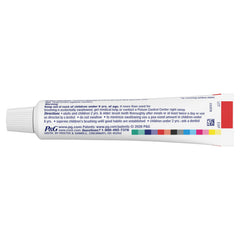 Brushing with Crest toothpaste reveals refreshing minty lather.