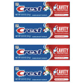 Crest travel-size toothpaste front view shows compact on-the-go design.
