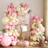 Crossfingers pink and yellow balloon arch kit setup for a stunning event backdrop.