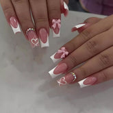CTTHNBD press-on nails in medium coffin shape with pink bow-heart design for elegant at-home manicure