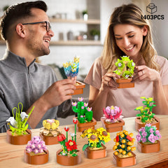 Detailed tiny succulents with terracotta pots arranged for a lifelike desk centerpiece by CUBIMANA