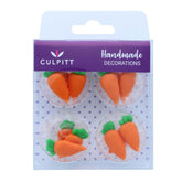 Culpitt carrot sugar pipings add bright orange decoration to cupcakes and cakes