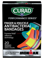 CURAD Ironman heavy-duty fabric bandage on skin during workouts