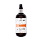 CurlSmith Moisture Memory Release bottle pour showing long-lasting hydration for fine curls.
