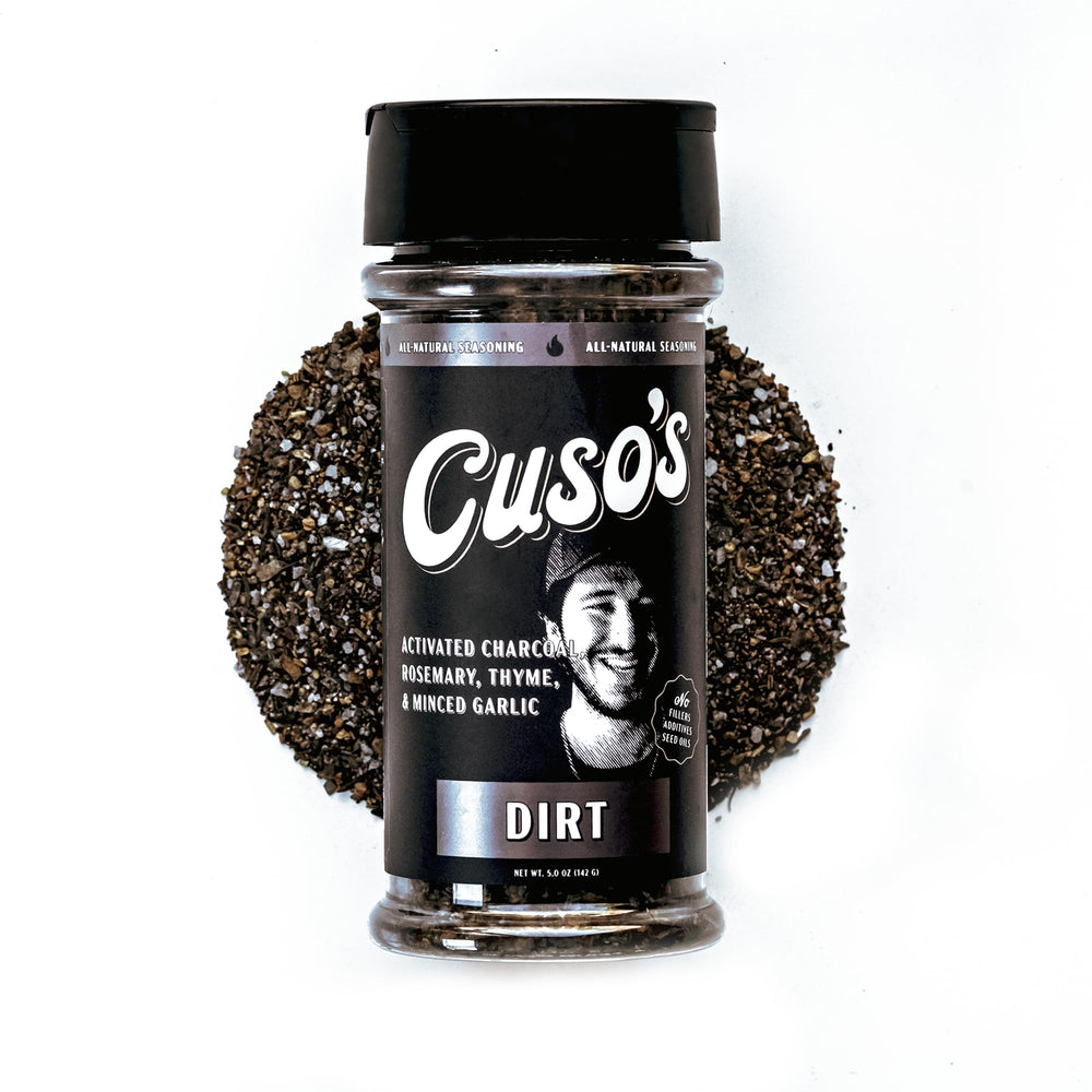 Cuso Cuts Dirt BBQ seasoning bottle adds bold smoky flavor to steaks and briskets.