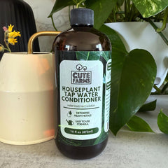 Cute Farms Tap Water Conditioner beside a hydroponics setup supports safer water for plants.