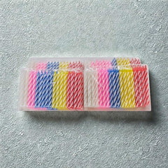 Cwise durable plastic holders keep candles upright during serving.