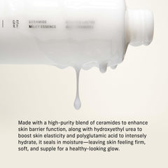 Hands applying CYKLAR Ceramide Milky Essence for smooth, hydrated skin.