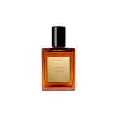 CYKLAR Sacred Santal perfume oil bottle pour reveals warm amber notes.