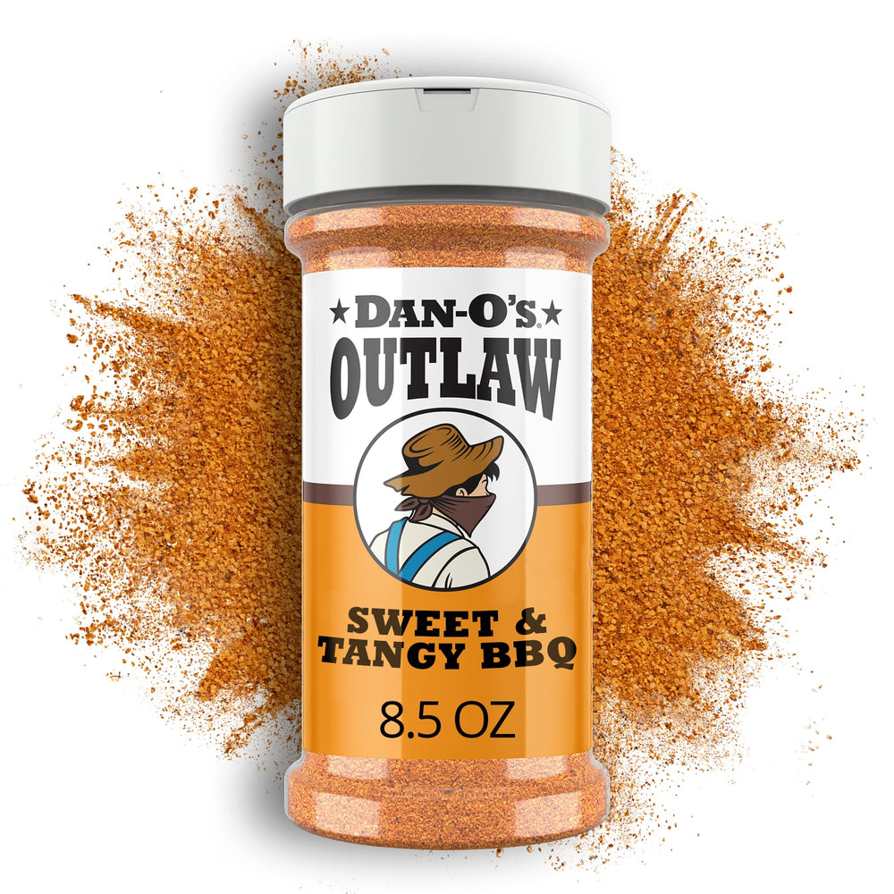 Dan-O's Outlaw Sweet & Tangy BBQ bottle close-up for bold grilling flavor