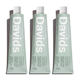 Davids fluoride-free toothpaste tube on counter for daily fresh breath.