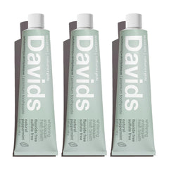 Davids fluoride-free toothpaste tube on counter for daily fresh breath.