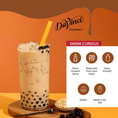 Amber DaVinci syrup in glass showing rich sweetness for coffee and drinks.