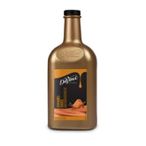 DaVinci Gourmet Classic Caramel Sauce bottle on counter showcases versatile flavor for drinks