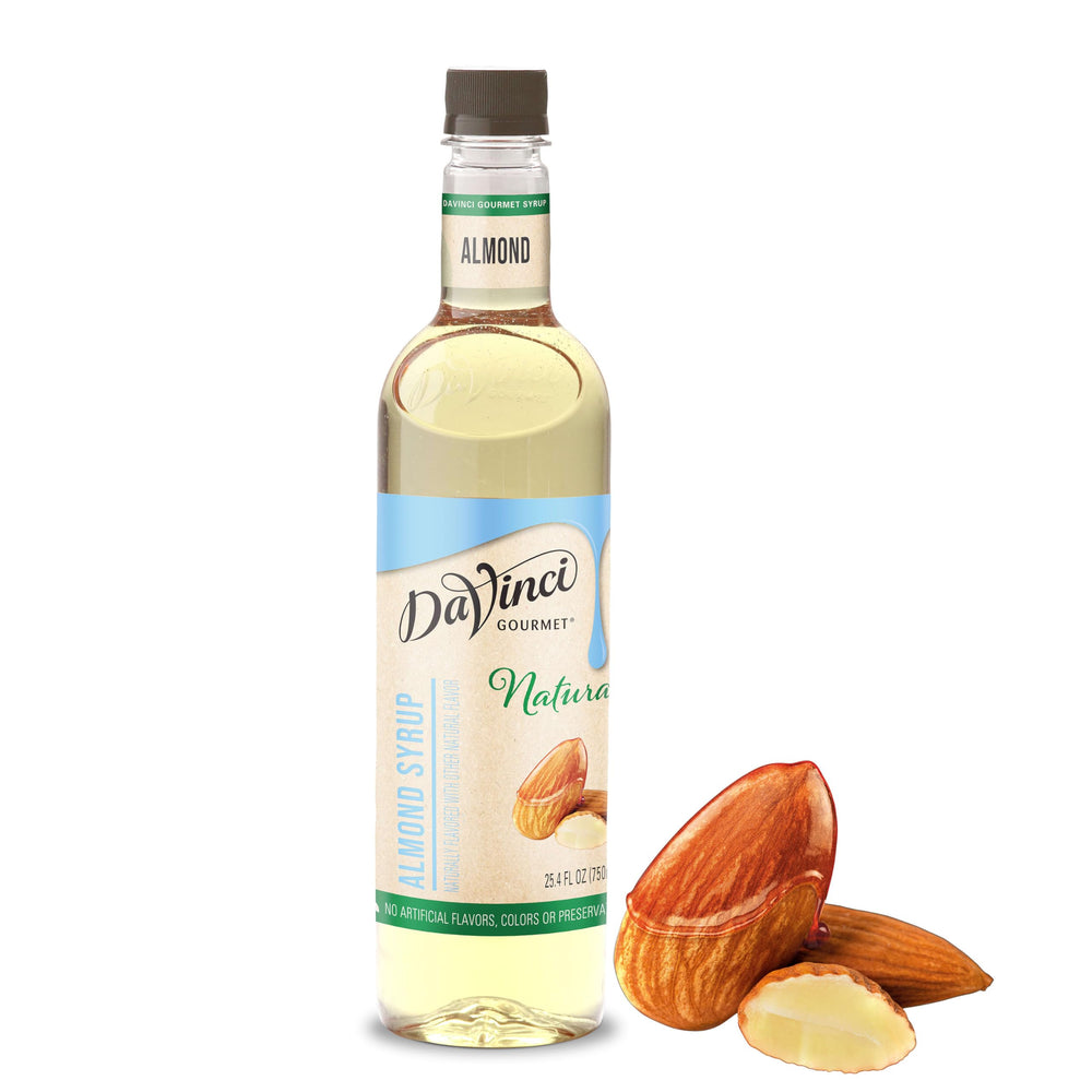 DaVinci Gourmet Naturals Almond Syrup bottle being poured for premium beverages