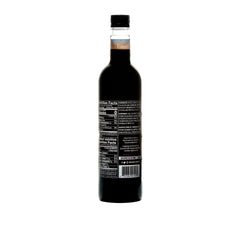 DaVinci Gourmet Sugar Free Chocolate Syrup being poured into coffee for rich flavor without sugar