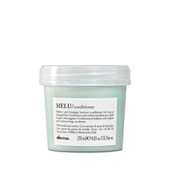 Davines MELU Conditioner bottle close-up highlights a lightweight, nourishing formula for long hair.