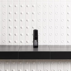Davines OI Soufflé applying to damp strands yields light volume and smooth finish.