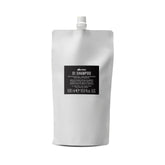 Davines OI Shampoo bottle showcasing milky-smooth cleanser for all hair types.