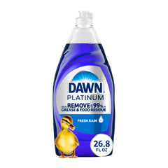 Dawn Platinum bottle pours, showing grease-cutting power for dishes.