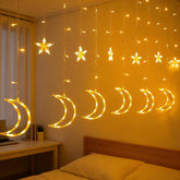 Dazzle Bright 138-LED Ramadan curtain lights create a warm star and moon glow.