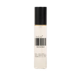 DedCool Mochi Milk EDP bottle close-up highlights peach nectar sweetness for daily wear.
