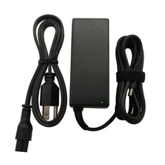 Dell 65W charger shown in compact travel case for easy packing.