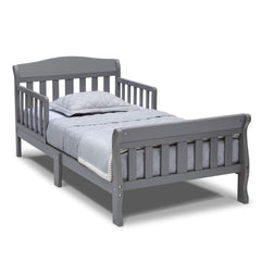 Delta Children Canton toddler bed grey front view shows sturdy wood construction for safe transition.
