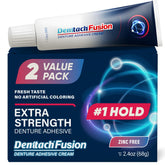 DENTTACH Fusion denture adhesive tube being applied for secure hold.