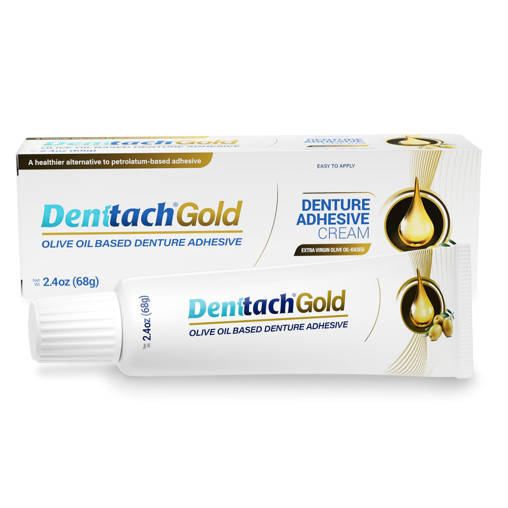 Denttach Gold olive oil base adhesive being applied for gentle adhesion