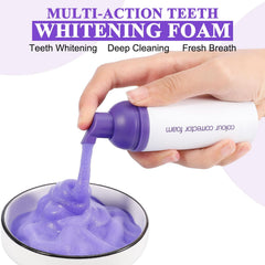 Person brushing with Dersoud toothpaste to spread smooth foam