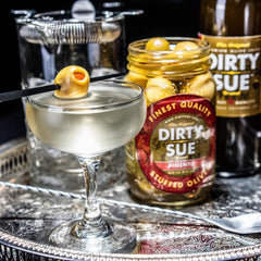 Two Dirty Sue bottles on bar ready for professional use