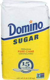 Domino granulated white sugar pack front, premium cane sweetness for baking and beverages.