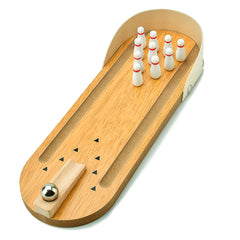 Donse table-top mini bowling pins on the lane for quick stress-free play at home.