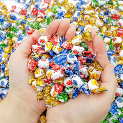 Donty-Tonty four flavor fruit mix featuring blackberry, peach, green apple, and cherry.