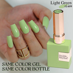 Double Rhythm Green A1409 brush stroke on nail showing glossy finish.