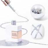 Double Rhythm metallic gel liner bottle close-up with bronze shimmer for nail art