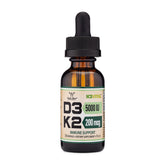 Double Wood Vitamin D3 K2 drops bottle on table highlighting all-trans K2MK-7 for absorption