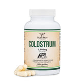 Double Wood Colostrum bottle label highlights purity and quality for daily wellness.