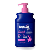DOUXO Skin & Coat SPA bottle shown for a gentle cleanse on sensitive skin.