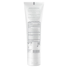 Dove Derma Scalp Conditioner being applied to scalp for gentle flake removal