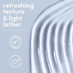 Hands applying Dove Serum Body Wash to show daily cleansing routine.