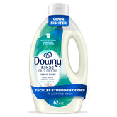 Downy Rinse odor remover pour bottle shows easy dosing for odor-free laundry.